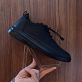 کفش مردانه بدون بند رنگ مشکی با زیره سفید، رویه چرم صنعتی، دور دوخت و بسیار راحت